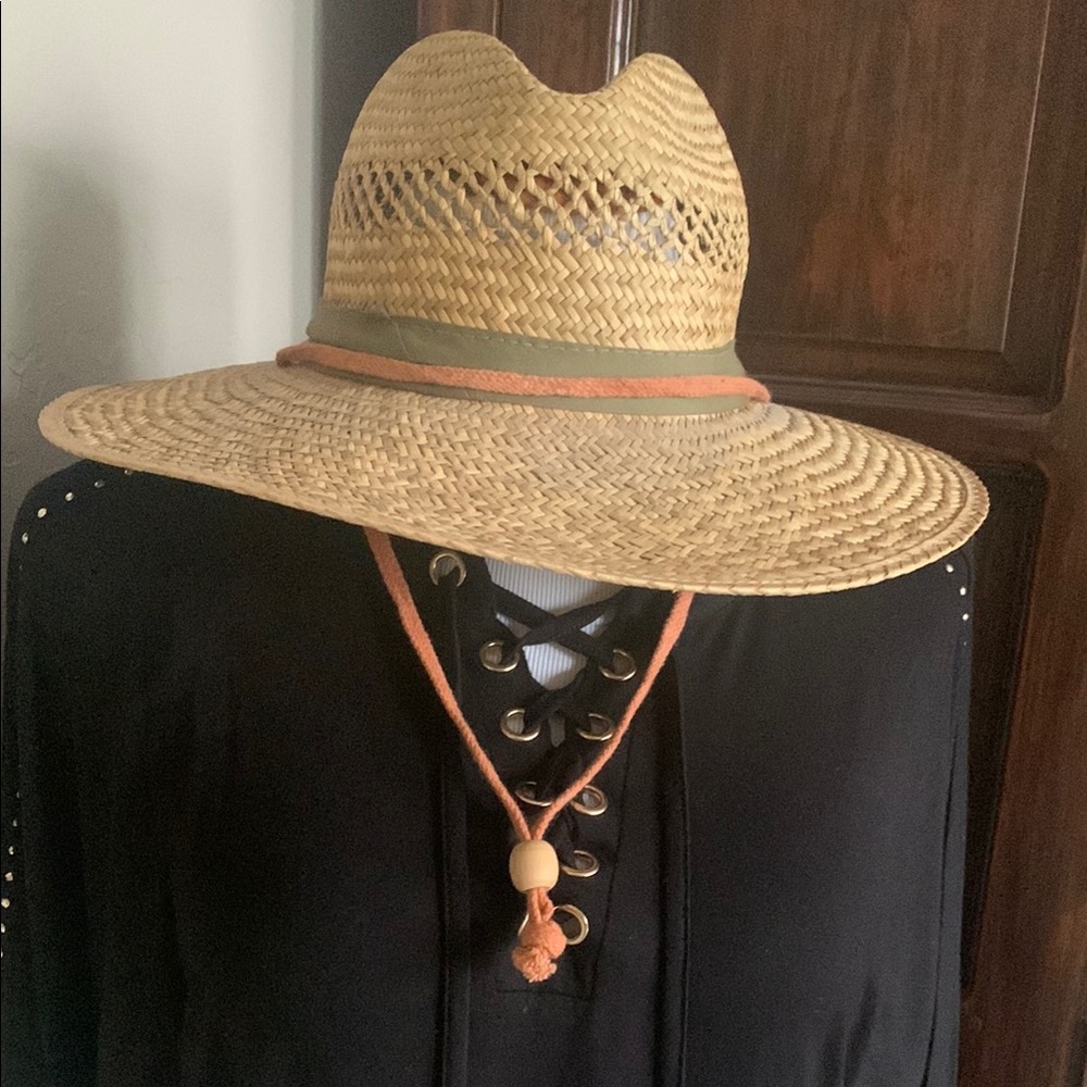 Tan Wide-Brimmed Hat with Intricate Weave